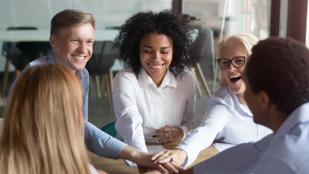 people engaging in purposeful living by building connections at a community event.
