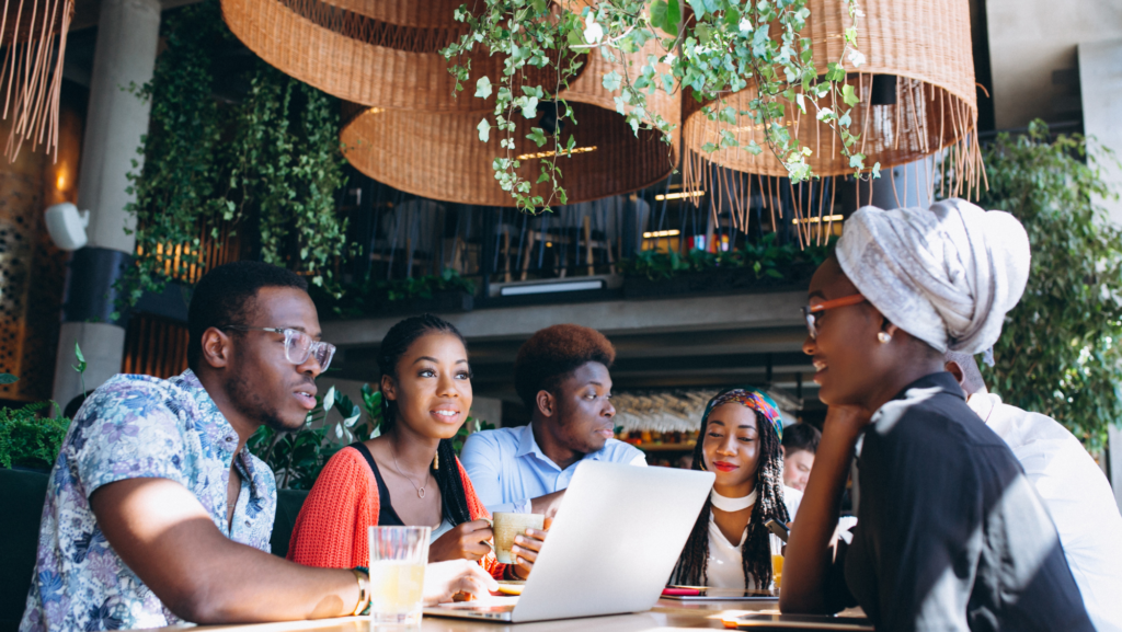 People networking and connecting in a professional setting, highlighting personal growth opportunities.